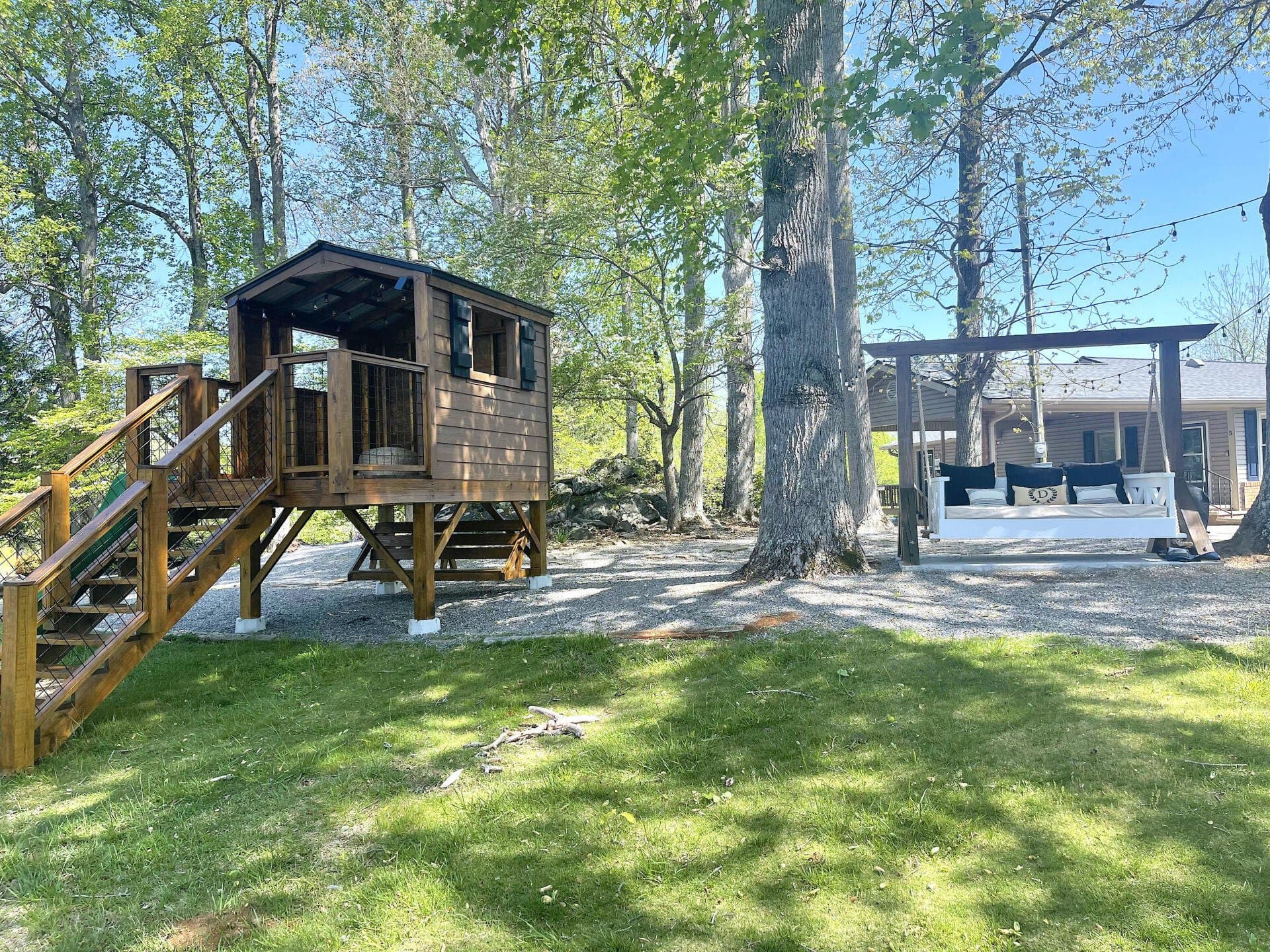 Outdoor bed swing at The Loft cabin, Tranquille Resort